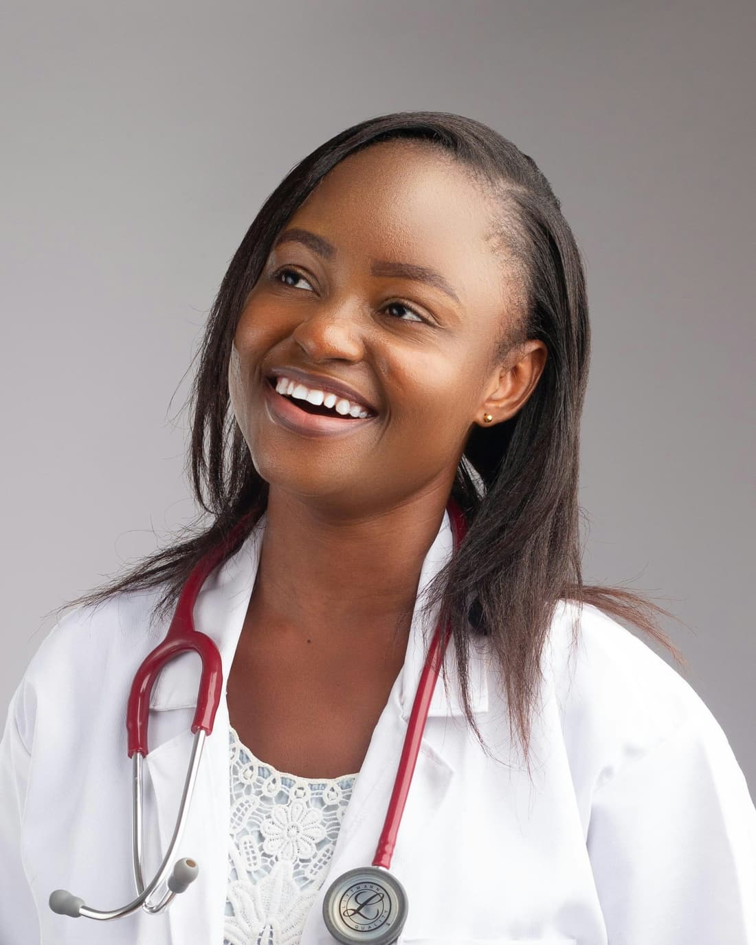 Portrait of Dr. Claire Whitman in a white coat